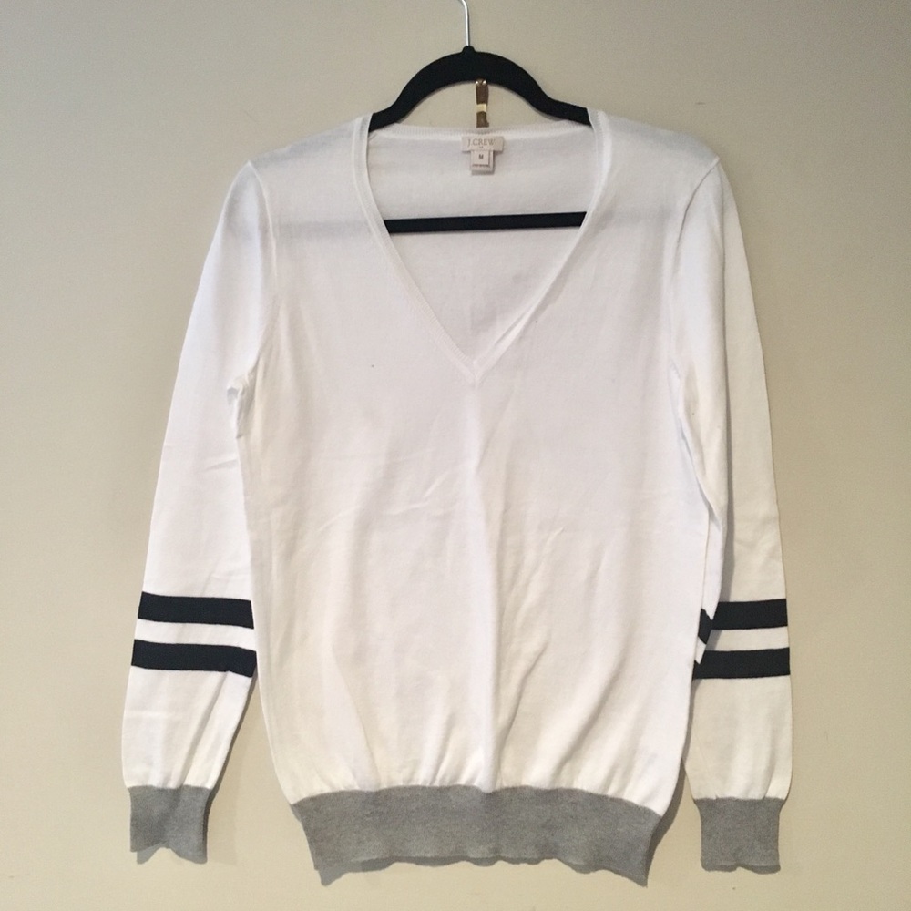 White vneck thin sweater.